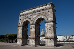 a triumphal arch, built where the main Roman road crossed the Charente river.